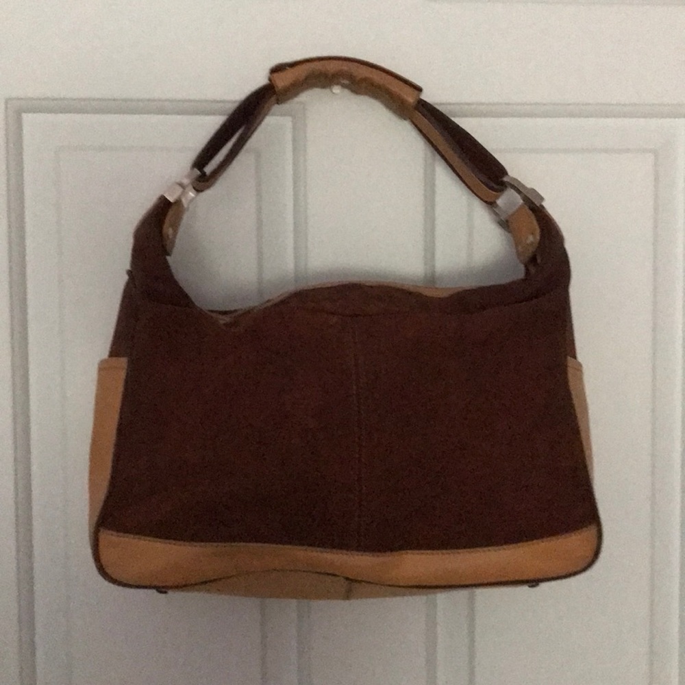 Tod’s handbag. Authentic. Worn, but very usable.